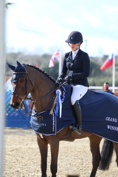 Lily Freeman-Attwood claims the CSI 3* Vilamoura Grand Prix